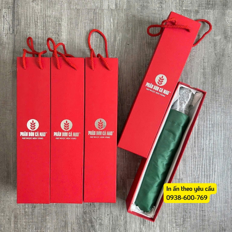 Dù cầm tay - Quà Tặng in logo công ty